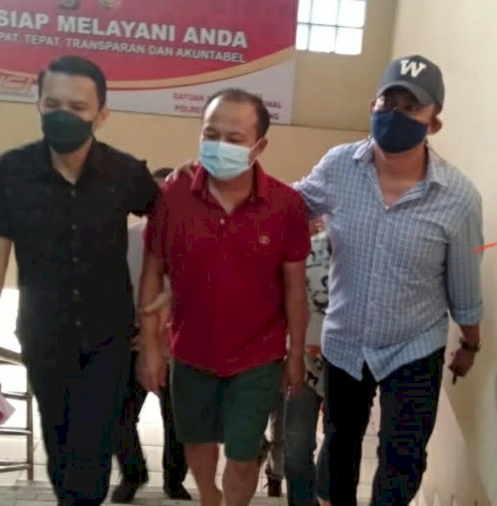 Pelaku saat ditangkap Polrestabes Palembang. (rmolsumsel.id/ist)