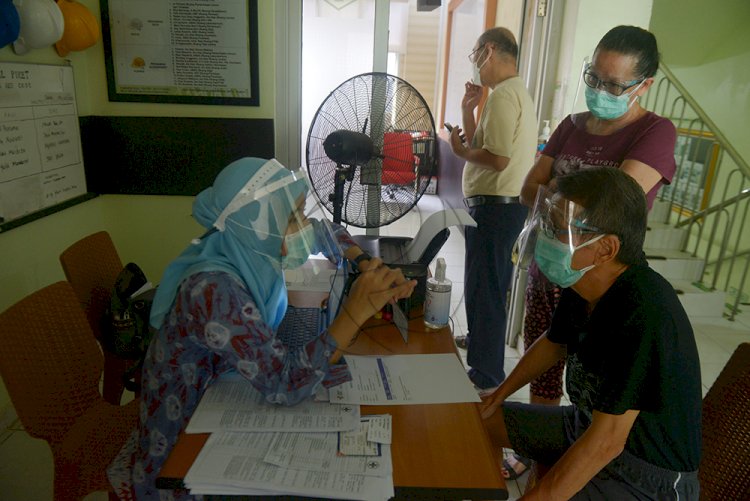 Pelaksanaan vaksin Covid-19 di Puskesmas Dempo Palembang, belum lama ini. (M Hatta/rmolsumsel.id)