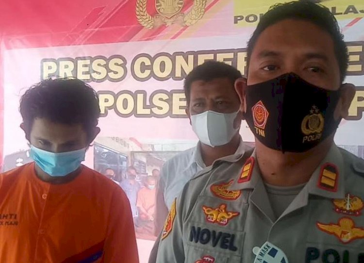 DPO Iwan Kurniawan saat ditangkap oleh Polsek Plaju. (Istimewa/rmolsumsel.id)