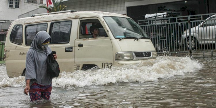 Banjir yang menggenangi salah satu kawasan Kota Palembang. (humaidy kenedy/rmolsumsel.id)