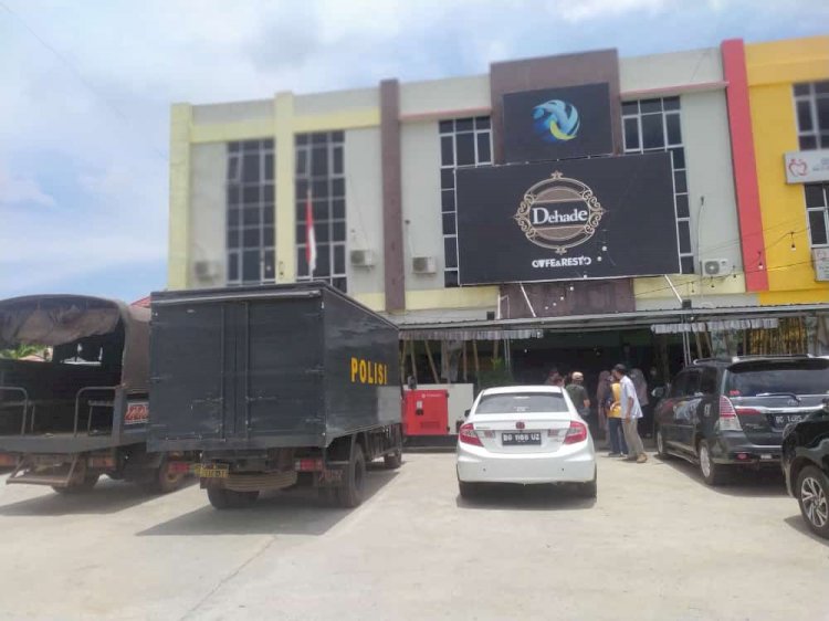 Kantor DHD Farm Indonesia yang berada di Jalan Residen H Amaluddin, Kelurahan Sukamaju Palembang dijaga ketat aparat kepolisian. (ist/rmolsumsel.id)