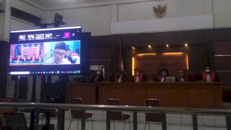 Terdakwa Ahmad Nasuhi membacakan Pledoi secara virtual/Yosep Indra Praja/RMOL