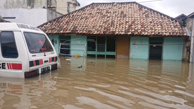 Kondisi banjir yang terjadi di Kota Palembang, Sabtu (25/12). (Mita Rosnita/rmolsumsel.id)