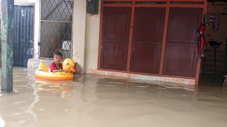 Kondisi banjir yang terjadi di Kota Palembang, Sabtu (25/12). (Mita Rosnita/rmolsumsel.id)