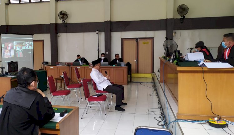 Terdakwa Juarsah saat menjalani sidang di Pengadilan Tipikor Palembang beberapa waktu lalu. (Yosep Indra Praja/rmolsumsel.id) 