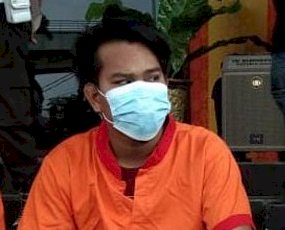 Tersangka Andika saat ditangkap Polrestabes Palembang. (Istimewa/rmolsumsel.id)