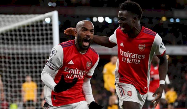 Selebrasi Alexandre Lacazette usai mencetak gol kemenangan atas Wolves/net