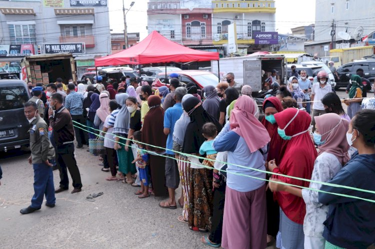 Suasana operasi pasar yang digelar di Pasar Sekip Ujung, Palembang. (Istimewa/rmolsumsel.id)