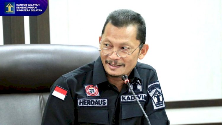 Kepala Divisi Keimigrasian Kanwil Kemenkumham Sumsel Herdaus. (Kemenkumham Sumsel/rmolsumsel.id)