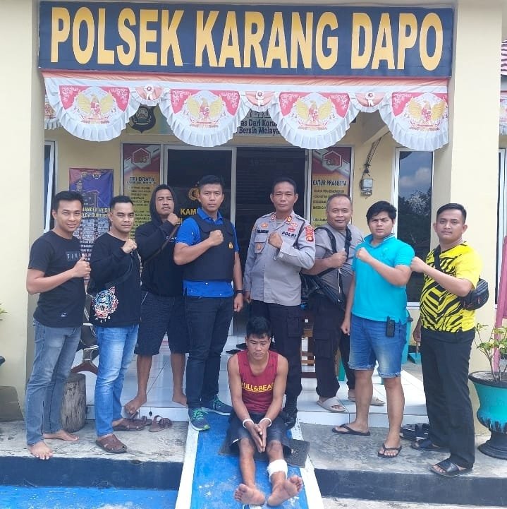 Riki (32) tersangka kasus pembunuhan saat berada di Polsek Karang Dapo, Muratara. (ist/ RmolSumsel.id)