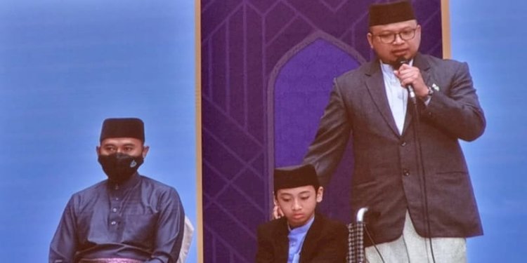 Muhammad Naja Hudia saat akan membacaan ayat suci Al Quran di Brunei Darussalam. (ist/rmolsumsel.id)