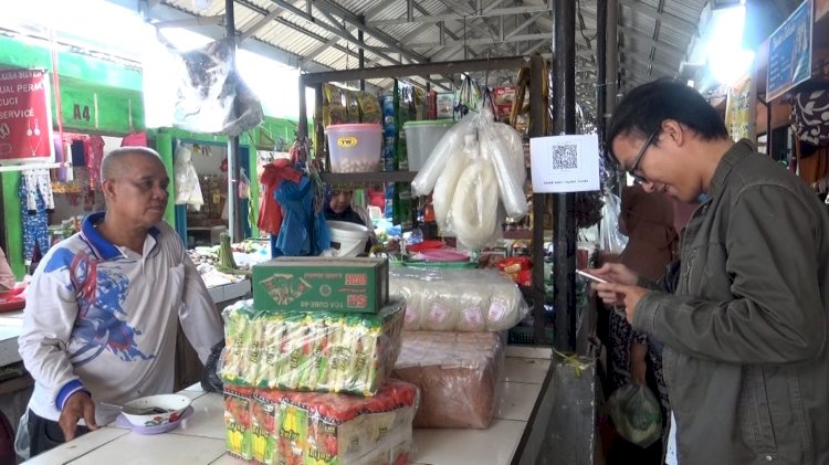 Pasar Baru Talang Jambe Palembang menerapkan transakai non tunai/ist
