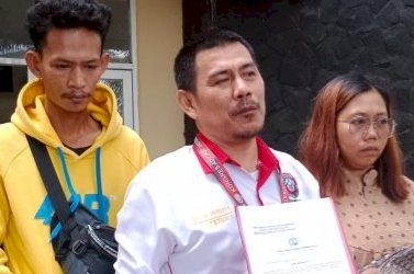 Korban didampingi kuasa hukumnya saat melapor ke SPKT Polda Sumsel/ist