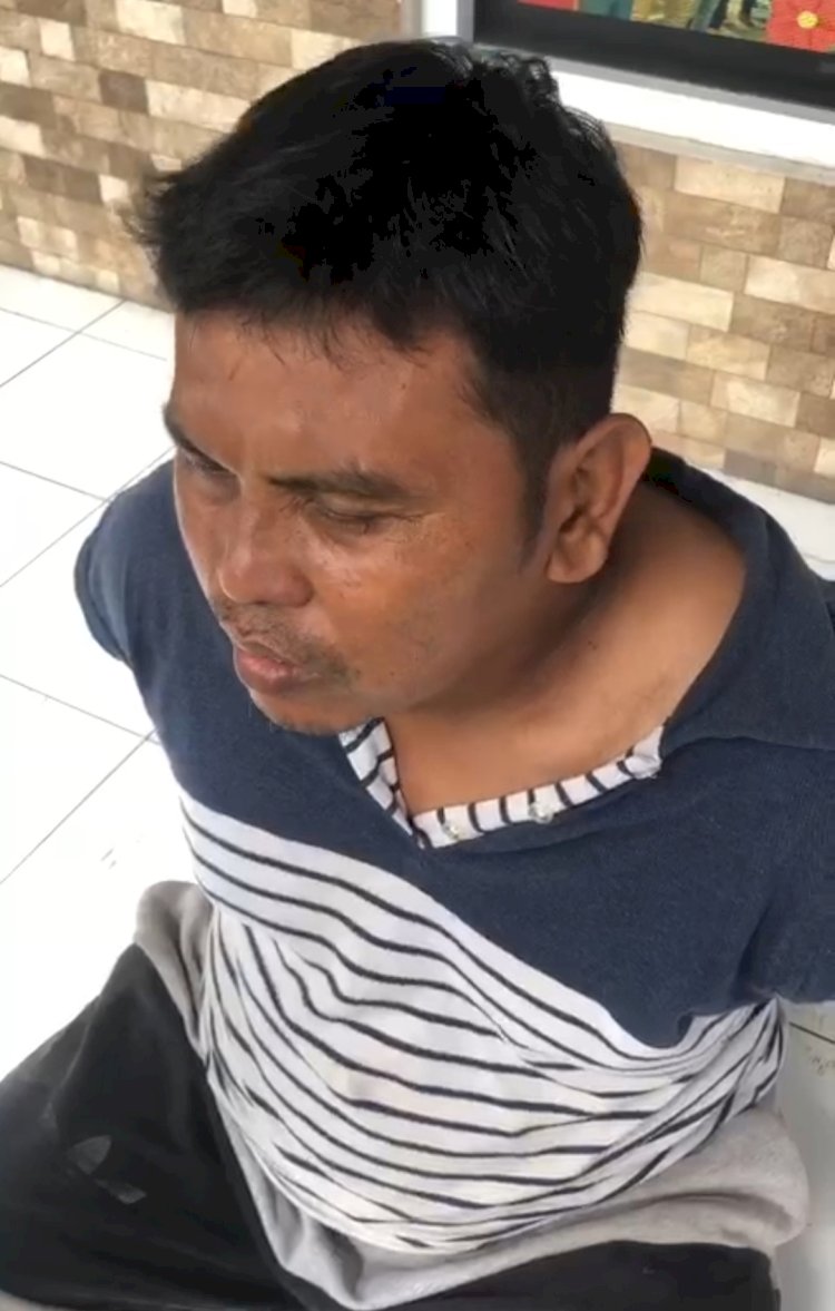 Candra Pratama alias Aak (29) pelaku begal yang buron dua tahun ditangkap oleh Satreskrim Polrestabes Palembang. (Amizon/ RmolSumsel.id)