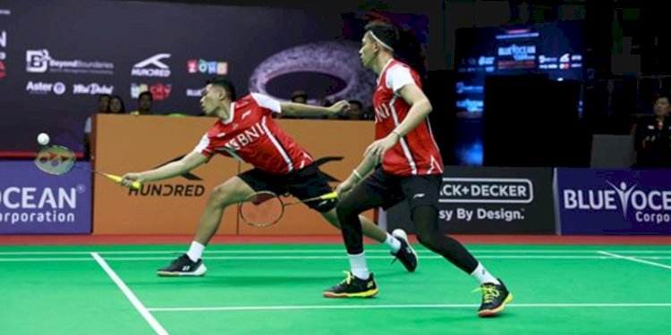 Fajar Alfian dan Muhammad Rian Ardianto saat bertanding di Badminton Asia Mixed Team Championship 2023 Dubai/Net