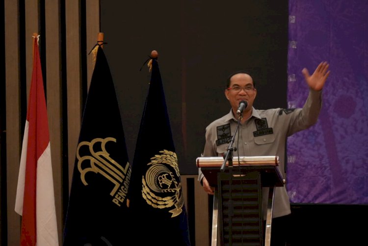 Kepala Kantor Wilayah KemenkumHAM Sumsel  Dr. Ilham Djaya saat  melaksanakan Perjanjian Kerja Sama dengan Lembaga Pengkajian Pangan, Obat Obatan, dan Kosmetika Majelis Ulama Indonesia (LPPOM MUI). (dok. Humas KemenkumHAM Sumsel)