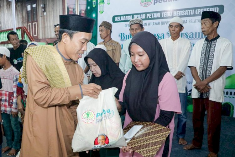 Pemberian bantuan pangan kepada anak Panti Asuhan Tunas Harapan di Desa Kota Raya, Kayu Agung. (ist/rmolsumsel.id) 