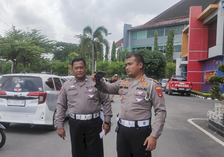 Kasat Lantas Polrestabes Palembang, AKBP Rendy Surya Aditama (kanan)/Foto:Adam Rachman