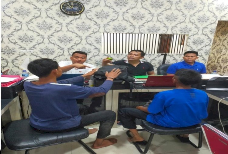 Dua tersanhka diamankan di kantor polisi/ist