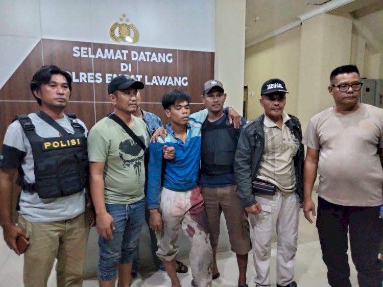 Tersangka Deni (kaki terluka) saat diamankan di Mapolres Empat Lawang. (ist/RmolSumsel.id)