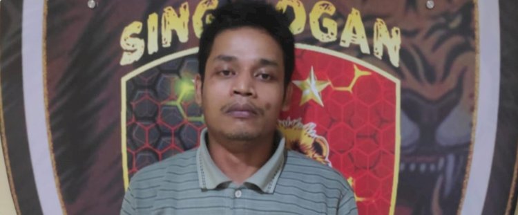 Tersangka Fahrizal saat berada di Polres OKU setelah menjadi tersangka penipuan. (ist/RmolSumsel.id)