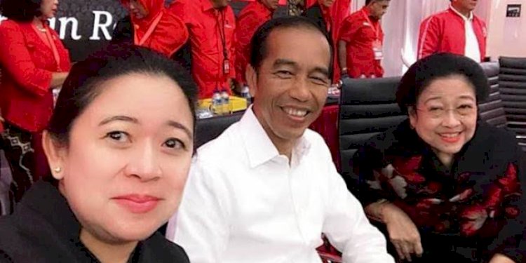 Ketua Umum PDIP Megawati Soekarnoputri didampingi Puan Maharani bersama Presiden Joko Widodo dalam satu kesempatan/Net