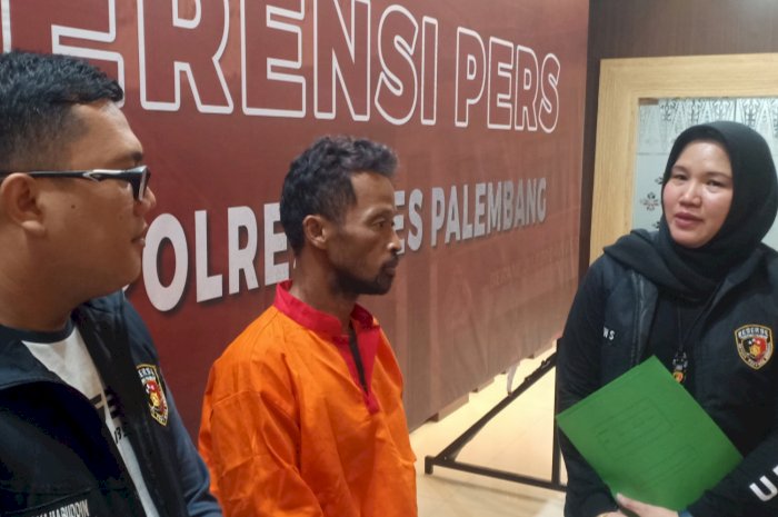 Hendri pelaku pencabulan lima keponakannya saat berada di Polrestabes Palembang. (Denny Pratama/RMOLSumsel.id)