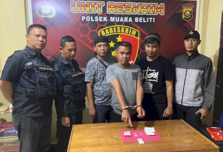 Tersangka Ahmadi saat diamankan petugas. (ist/rmolsumsel.id)