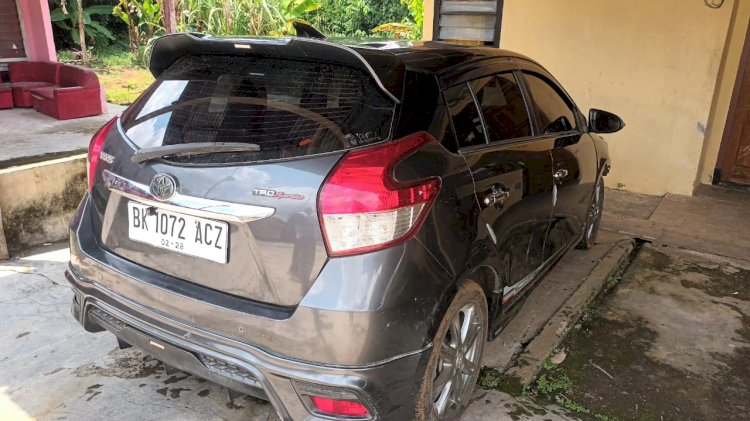 Mobil milik warga Kabupaten Empat Lawang yang telah hilang dicuri 3 bulan lalu ditemukan di kebun karet belakang pemakaman umum di Desa Ketuan Jaya, Kecamatan Muara Beliti, Kabupaten Musi Rawas. (Dokumentasi Polisi)