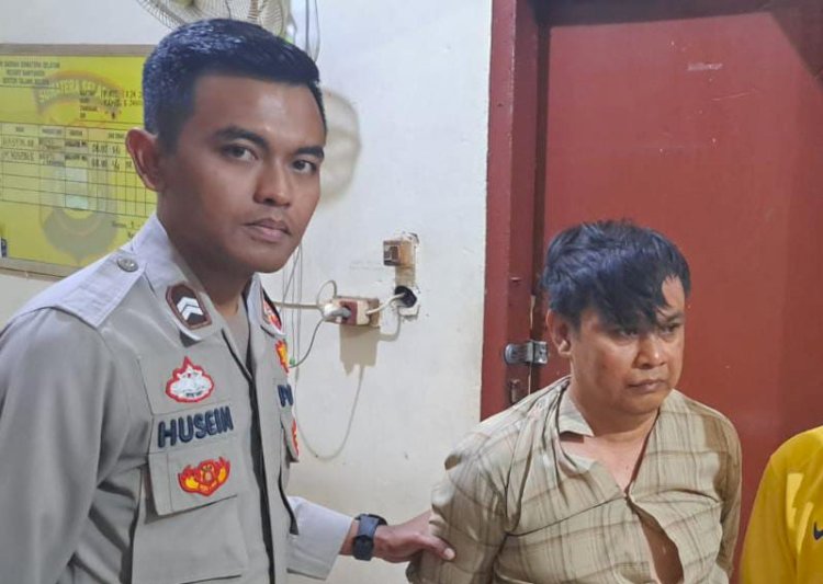 Anggota Polsek Talang Kelapa saat mengamankan Kurdi. (Polsek Talang kelapa/rmolsumsel.id) 