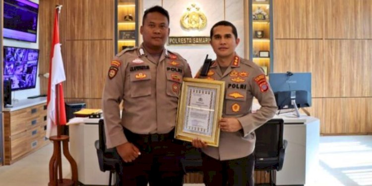 Anggota Polsek Samarinda Hulu Bripka Joko Hadi Aprianto (kiri)/Ist