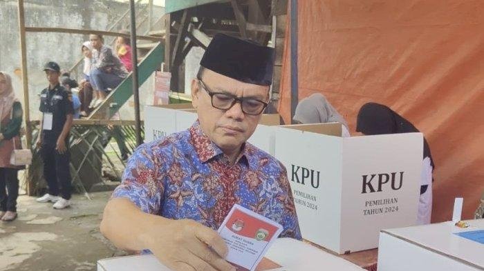 Joncik Muhammad saat mencoblos di TPS/ist