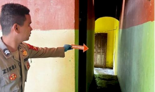 Polisi saat melakukan olah tempat kejadian perkara di lokasi temuan mayat/ist