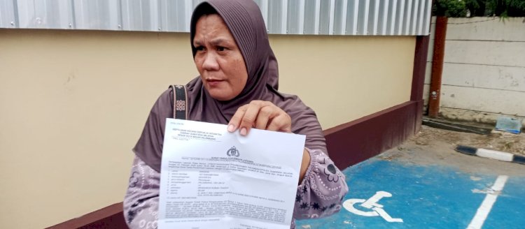 Korban Ardiana ketika membuat laporan polisi/ist